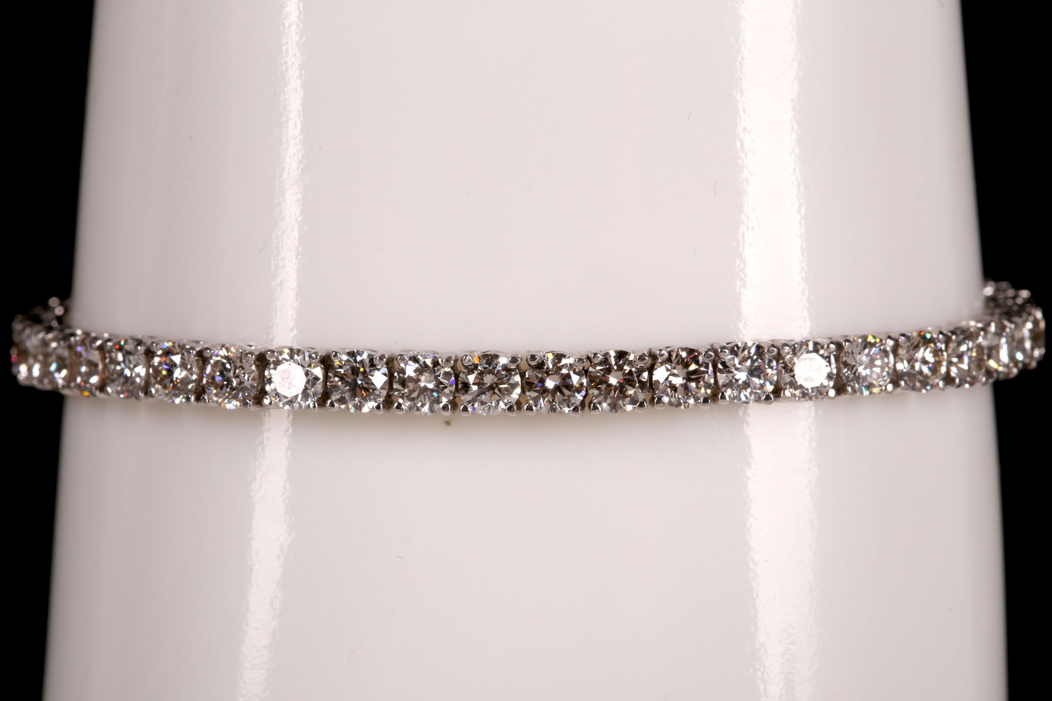 A 14k white gold and diamond line bracelet, 9.25ct total.