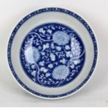 A 19th / 20th Century Chinese porcelain blue floral decorated bowl, bearing six character mark