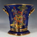 A Carltonware vase, pattern No2728, being a flared form with blue ground and enamel decorated in