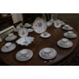 A Nymphenburg porcelain table service, to include a standish, plate, two square section bowls,