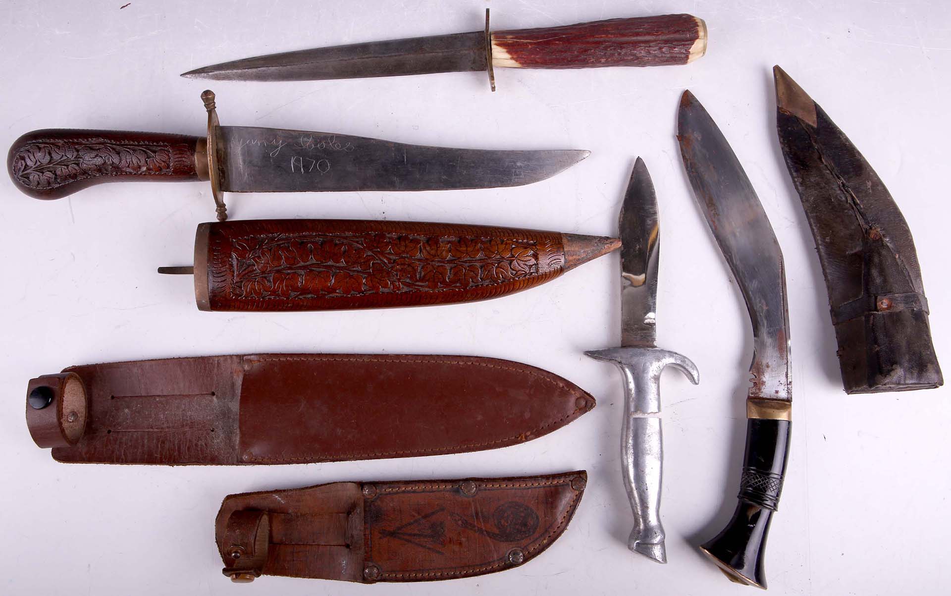 Four knives, including aluminium hoof handle and kukri.