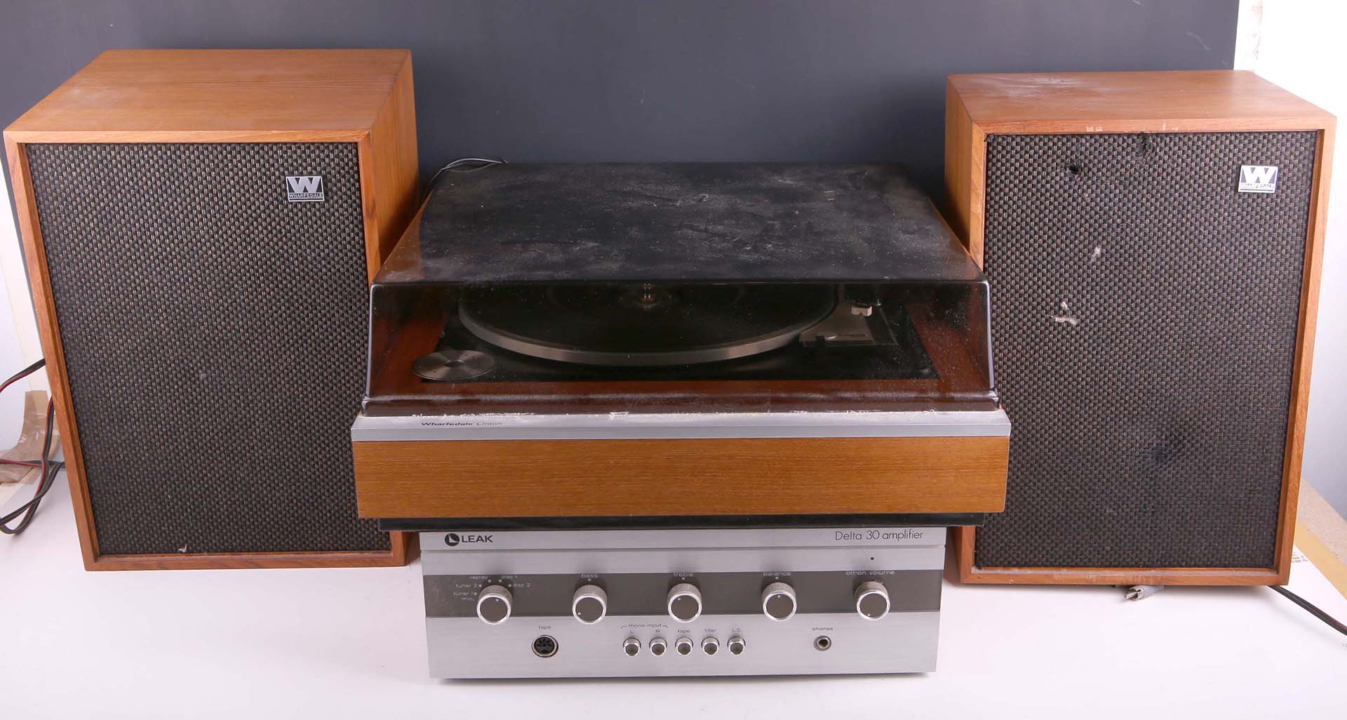 A 1970`s hi fi Wharfedale Linton turntable, a pair of Wharfedale Denton two bookshelf speakers and