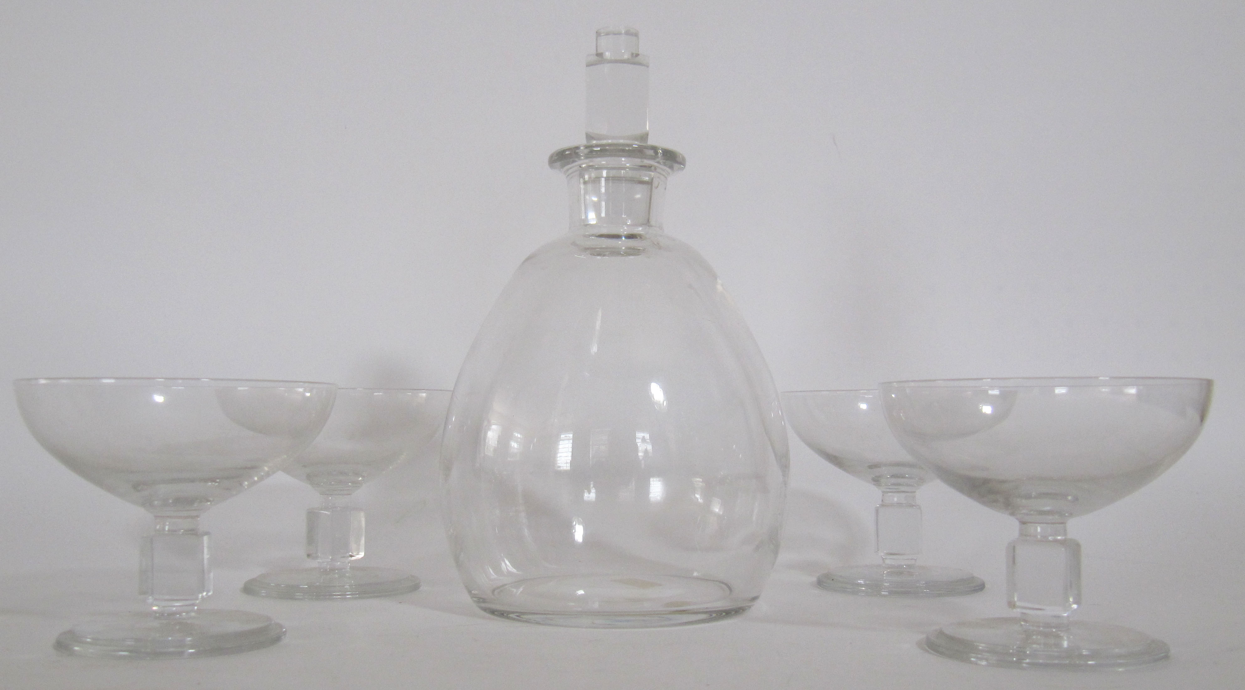 A Lalique Argo style decanter and liqueur glasses, mid 20th Century, the bulbous decanter with