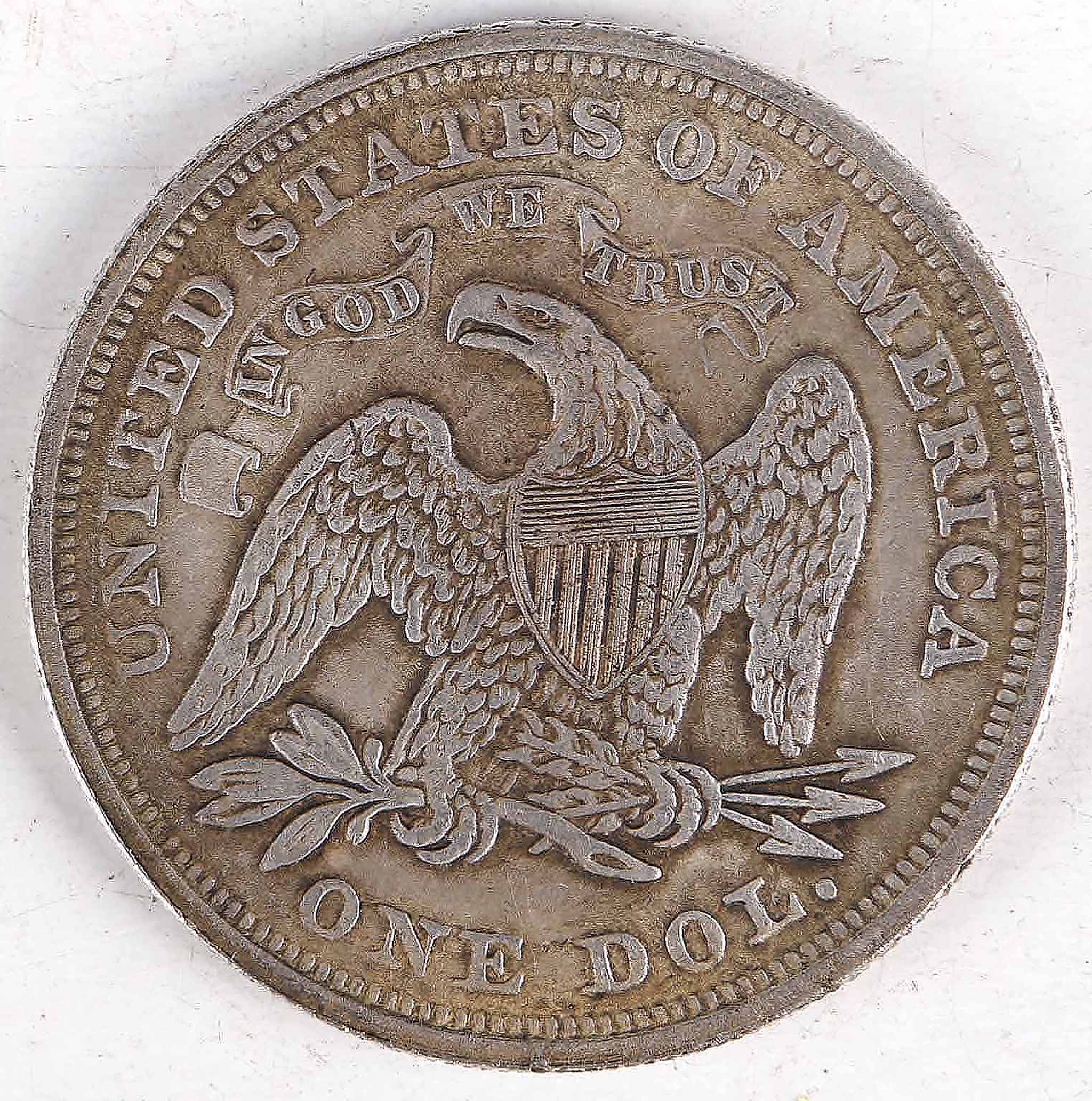 An 1872 American eagle dollar, in good fine condition.