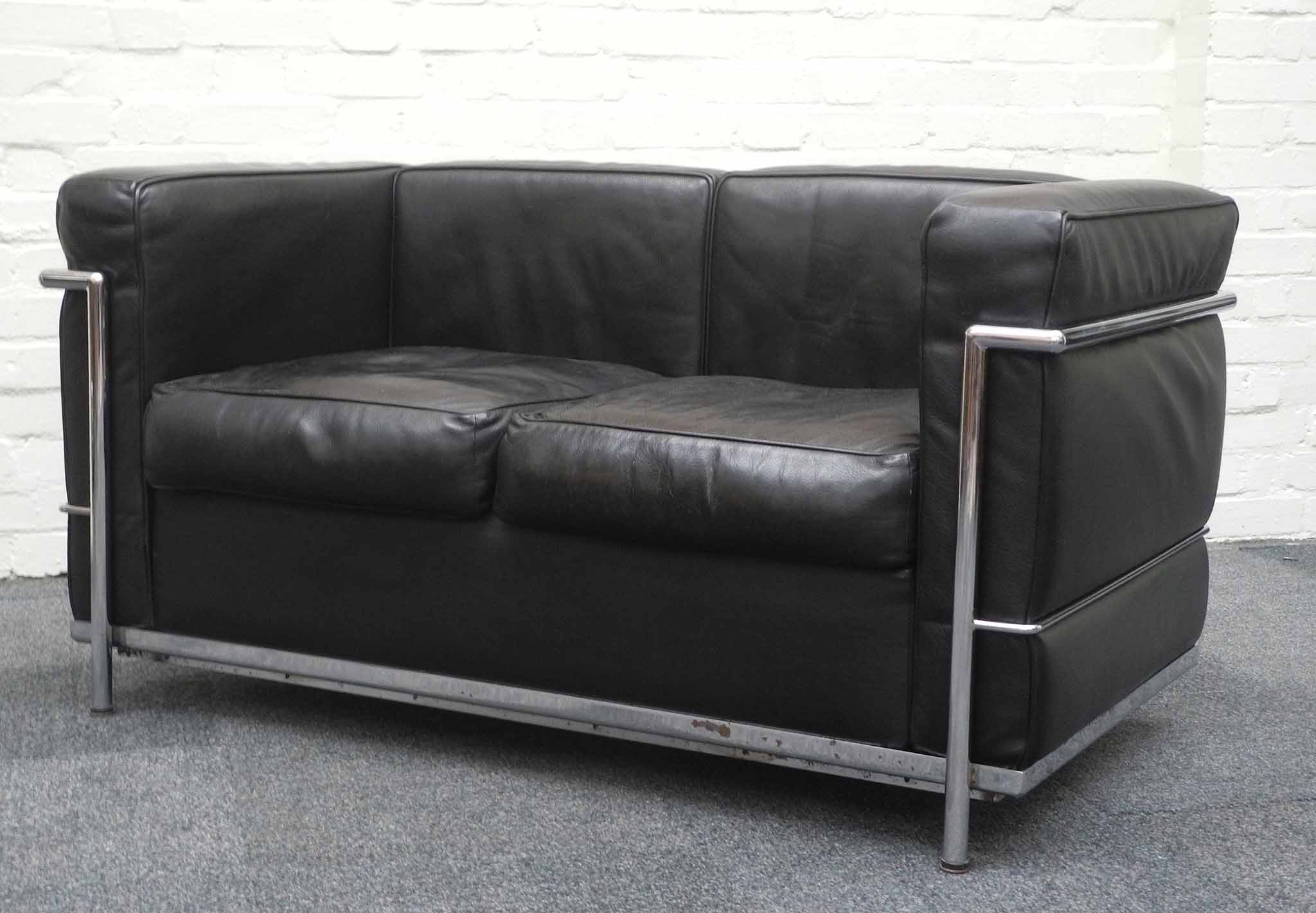 An LC2 petit comfort sofa, designed by italian manufacturer, late 20th Century, a two seater sofa