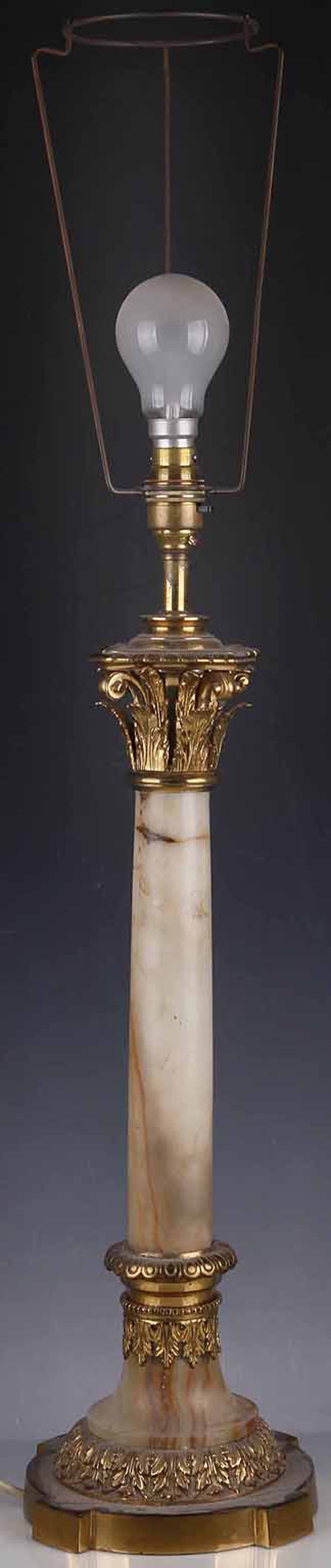 An early 20th Century onyx and gilt metal table lamp base, with Corinthian capitol, together with