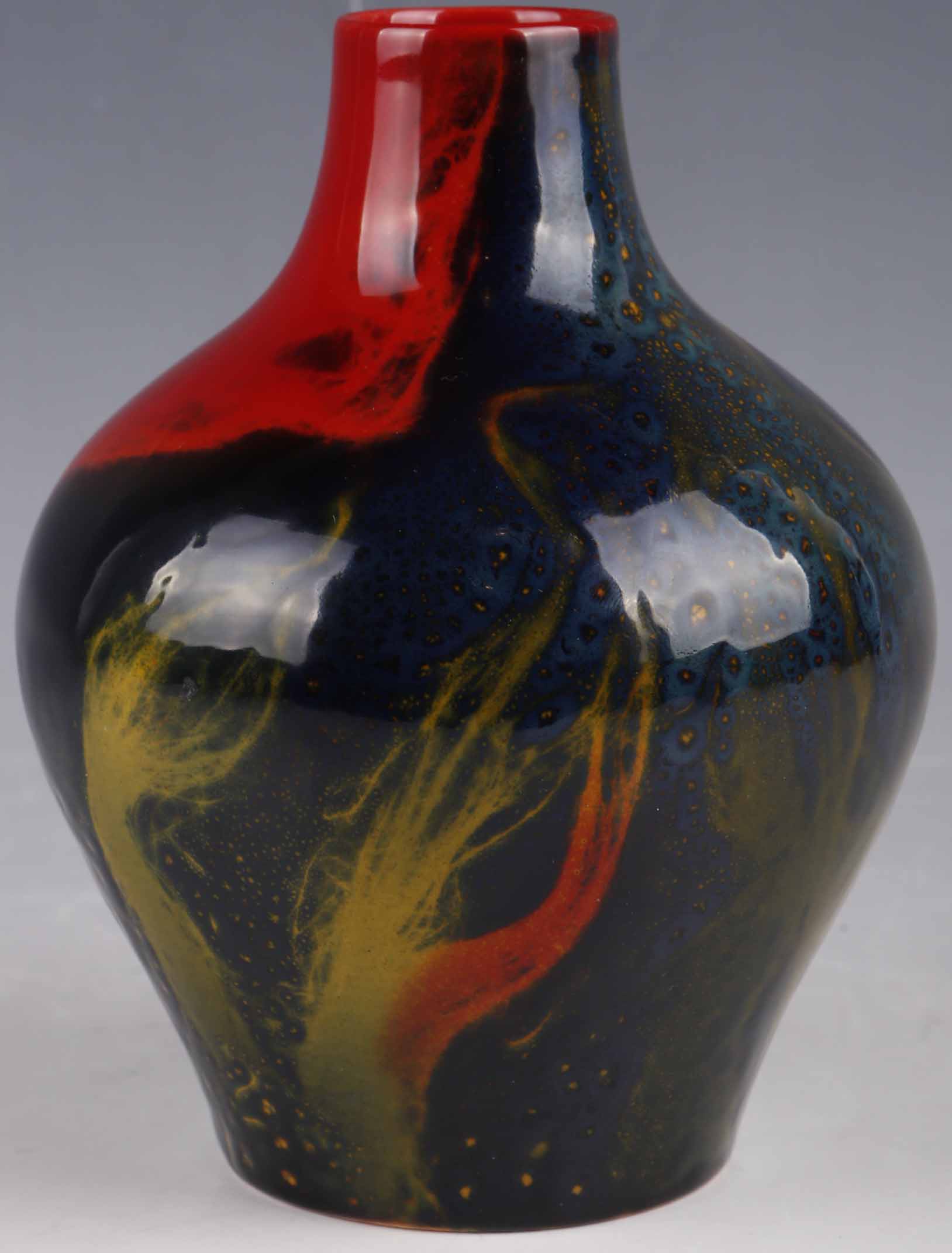 A Royal Doulton Sung flambé vase, circa 1920, gourd shaped vase with experimental pattern, marked `