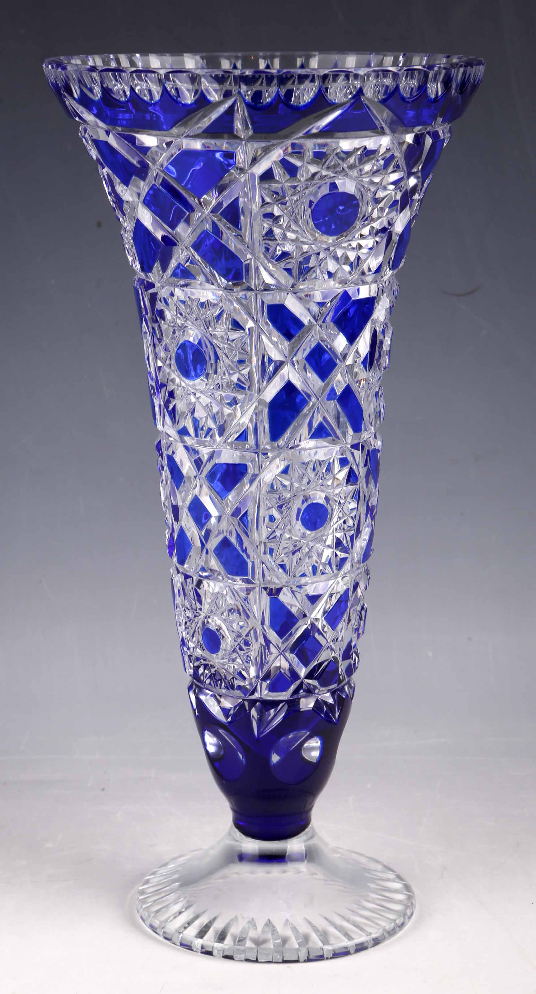 Attributed to Val St. Lambert, a crystal hand cut to clear, cobalt blue overlay vase, mid 20th