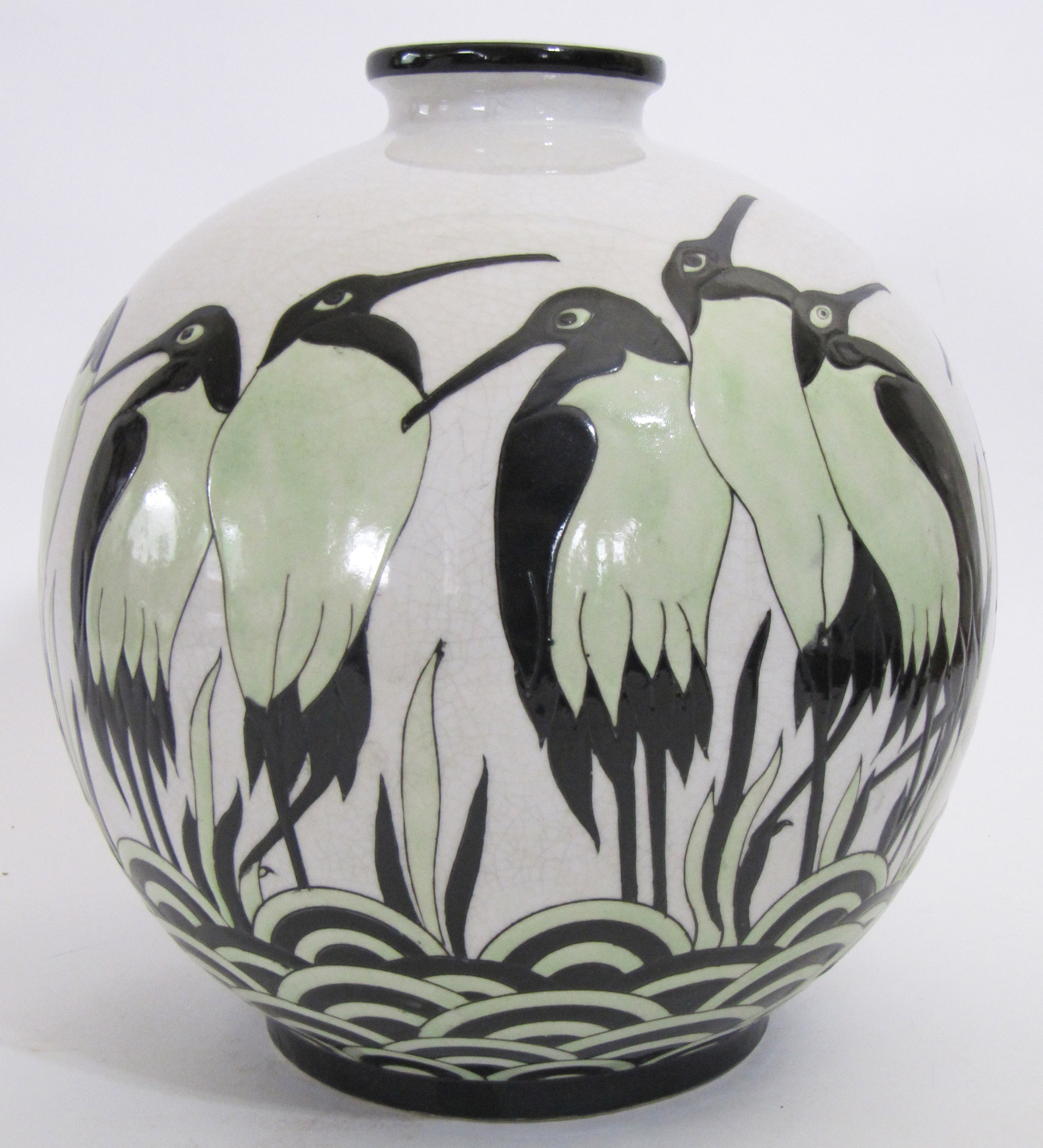A Keralouve Stork vase, incised Art Deco pattern in green and black glaze on white ground. 30cm H