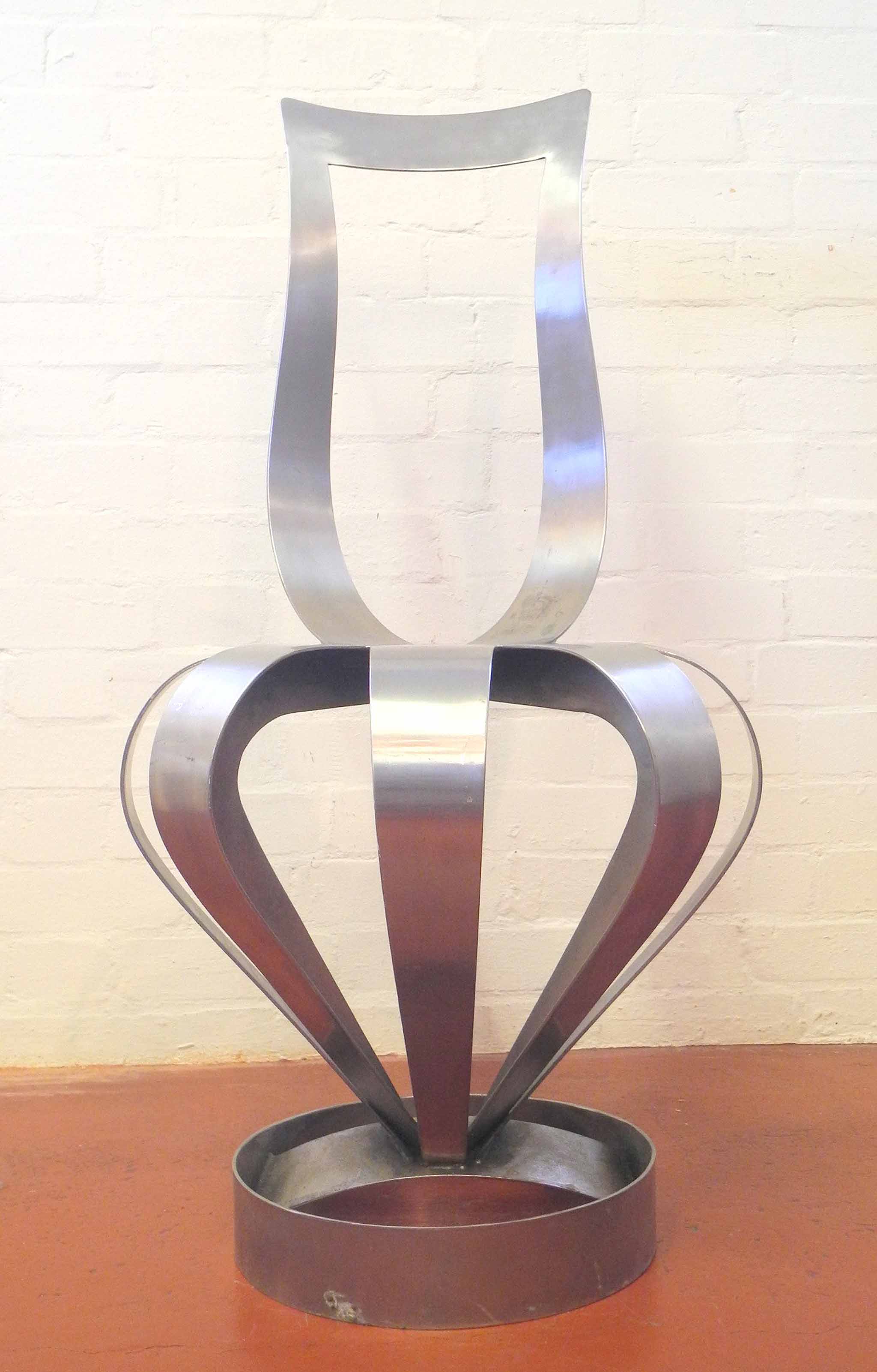 A Tom Dixon Crown Chair, designed and produced by the designer circa 1988, welded steel