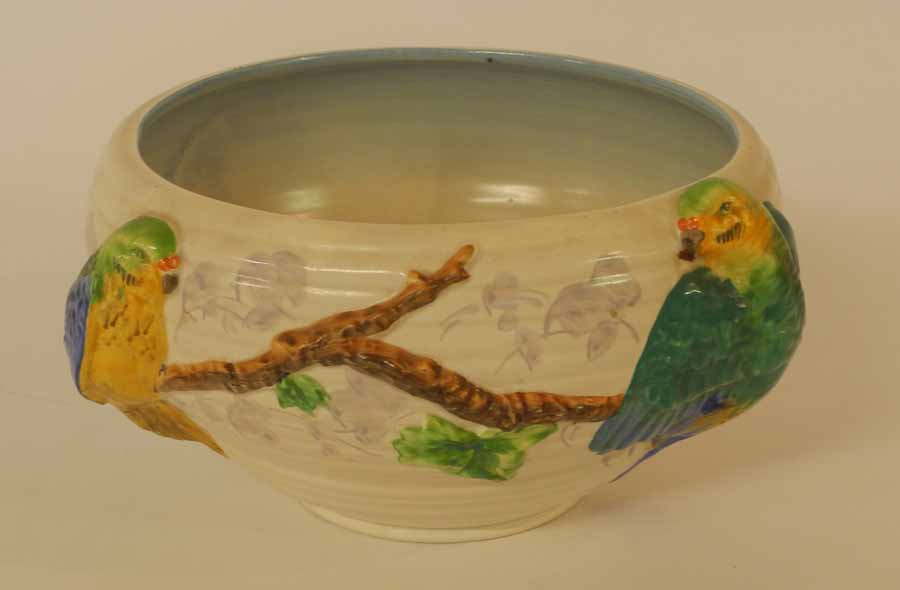 A Clarice Cliff bowl, the circular bowl with bowed sides moulded with concentric rings, decorated