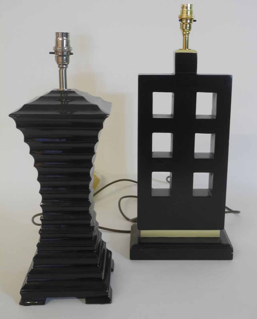 A modern black ceramic ribbed table lamp, together with another table lamp. (2)