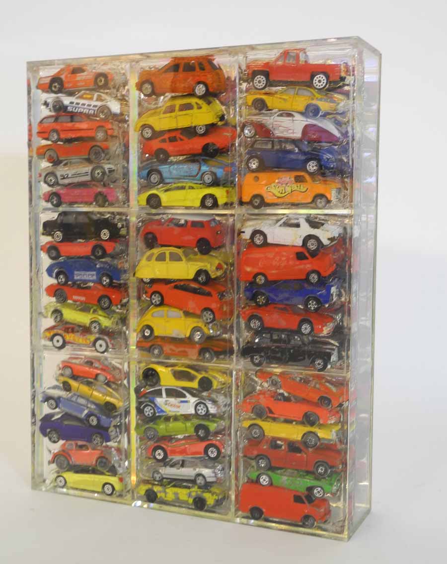 Bob Osborne (b. 1953), a resin car sculpture, incorporating a collection of die cast cars