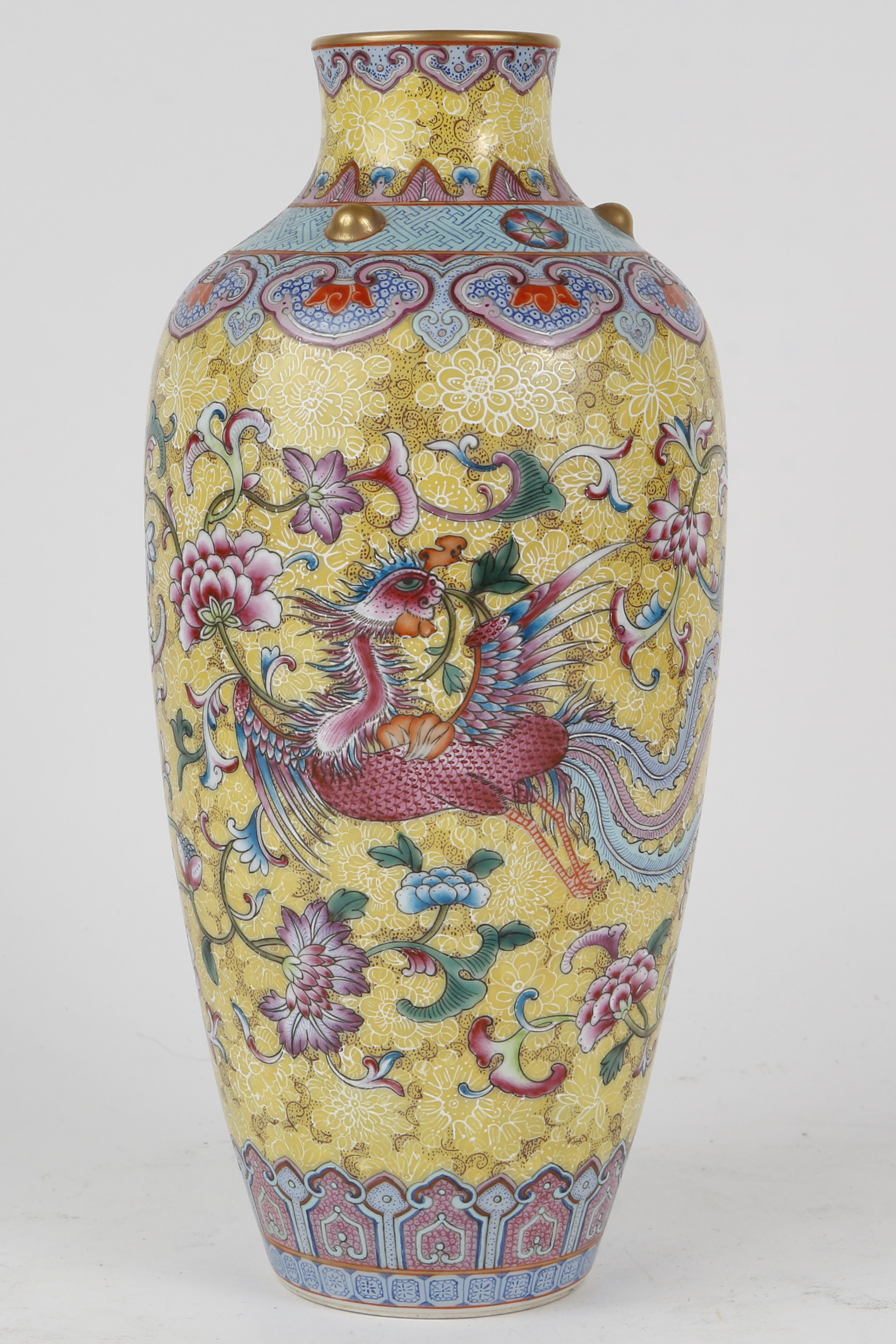 A 20th Century Chinese vase, the imperial yellow ground having enamel decoration of dragon,