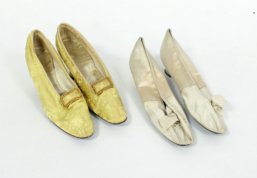 A pair of satin evening shoes, with bows and calf-lined interior and another pair of lady's shoes