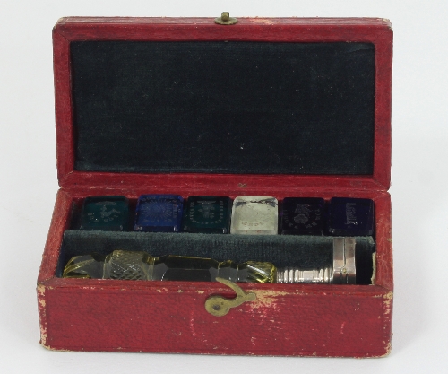 A cased desk seal with glass handle and six glass interchangeable seals, 'Bon Soir', 'All is