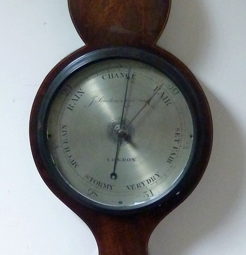 A 19th Century mahogany two-part wheel barometer, the silvered dial signed J Somalvico, 4 Leather