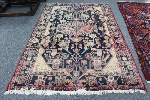 A Hamadan rug with central blue ground geometric field and border, 254cm x 153cm (100" x 60.25") and - Image 2 of 4