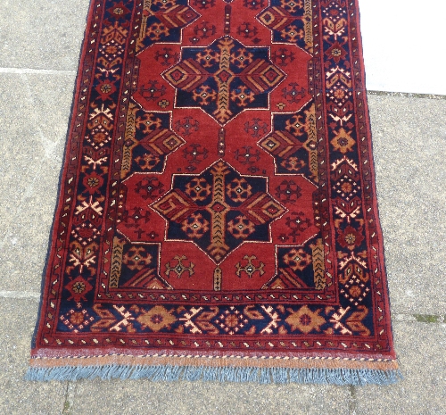 A Hamadan style rug with four central star medallions, 205cm x 79cm (80.5" x 31"), another rug - Image 2 of 5