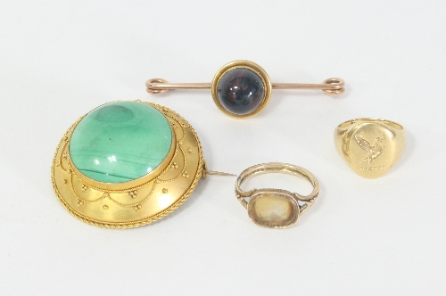 A collection of jewellery including; an 18ct gold signet ring, the oval plaque engraved with a