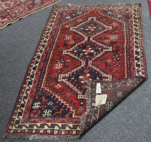 A small Hamadan rug with triple pole medallion on a red ground, 157cm x 100cm (61.75" x 39.5") and - Image 3 of 5