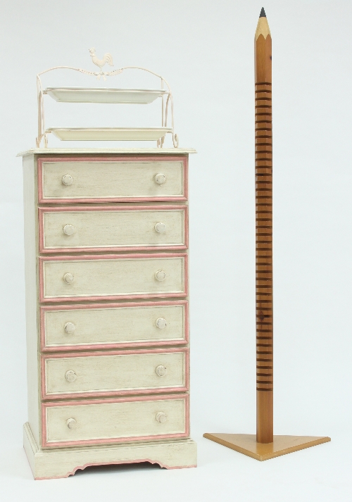 A painted pine chest of six drawers, a CD stand in the form of a pencil, and a two-tier soap dish