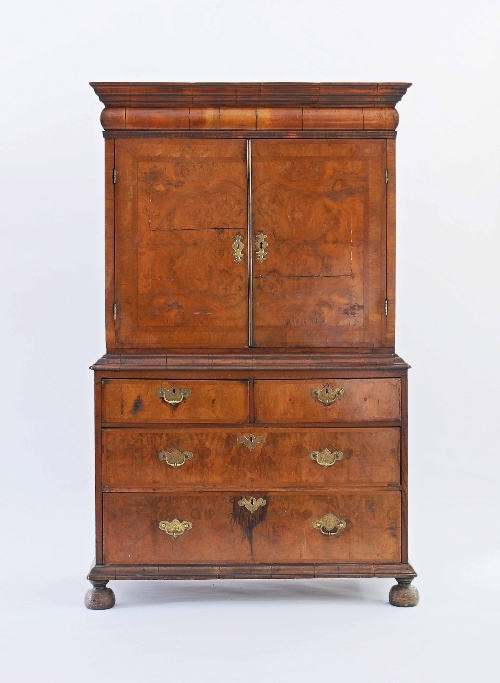 A Queen Anne walnut cabinet-on-chest, the bolection moulded drawer above two doors enclosing smaller - Image 2 of 2