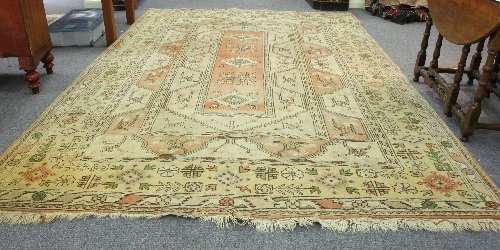 A Turkish carpet of geometric design within a multiple border, 345.5cm x 236cm (136" x 93")