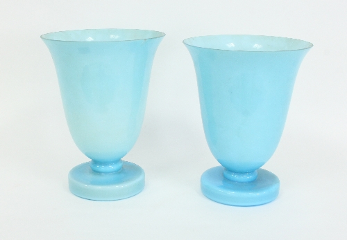 A pair of opaque blue glass vases, of flared form on circular feet, 26cm (10.25") diameter