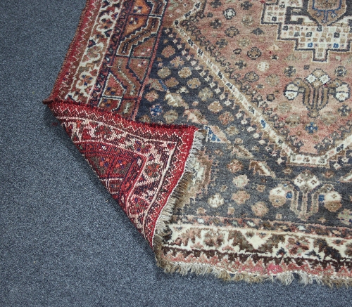 A Turkey rug with triple pole medallion on a pink ground, 210cm x 152cm (82.5" x 59.75") and another - Bild 2 aus 4
