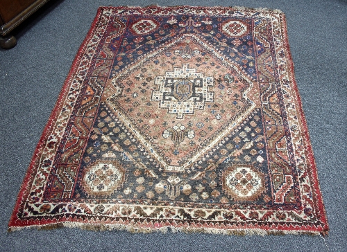 A Turkey rug with triple pole medallion on a pink ground, 210cm x 152cm (82.5" x 59.75") and another
