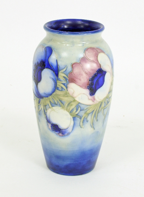A Moorcroft baluster vase, Anemone pattern, the flowers on a graduated blue ground, impressed