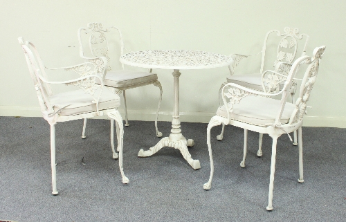 A set of four painted aluminium garden armchairs and a circular table, 72cm (28") diameter