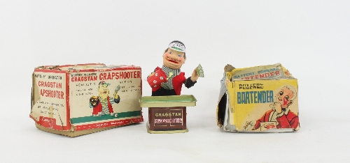 A Japanese tin plate novelty toy 'The Cragston Crapshooter' and another, Bartender by Rosko, both