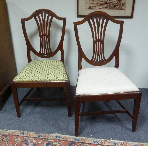 A set of six mahogany shield-back dining chairs, on square tapering legs
