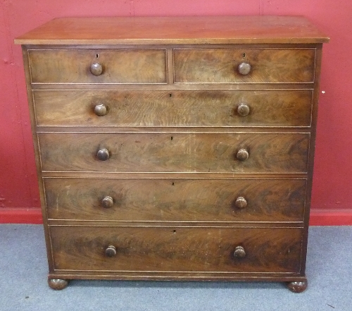 A Victorian mahogany chest of two short over four long drawers on bun feet, 116cm (45.75") wide