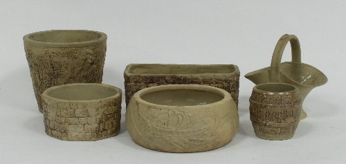 A large collection of Hillstonia pottery including planters