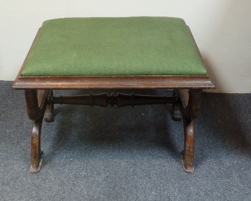 A William IV rosewood framed stool, the carved moulded end supports united by a turned stretcher,