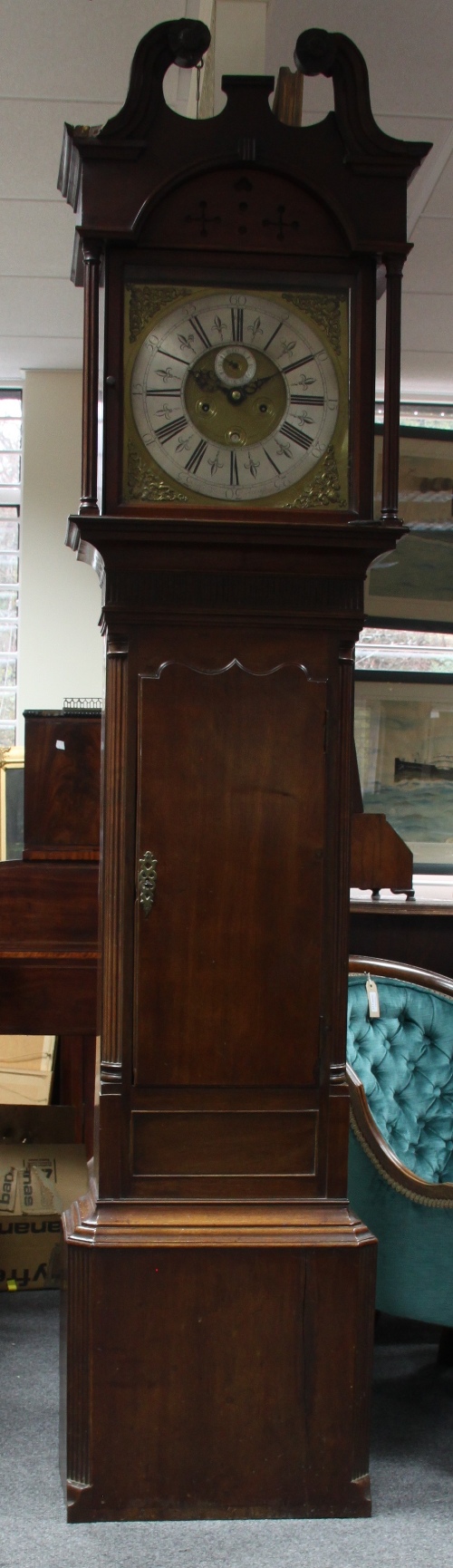 A Georgian mahogany longcase clock, the 34.25cm (13.5") brass dial with eight day movement with