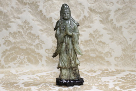 A Chinese green jade figure depicting the immortal. Height 30cm, Width 13cm