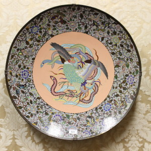 A fine large Japanese meiji period cloisonné charger depicting the phoenix. Diameter 60cm