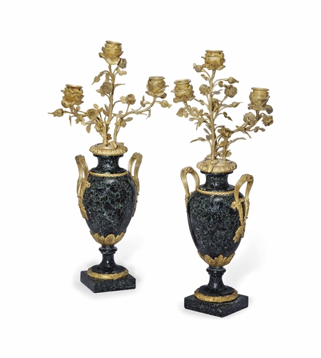 A PAIR OF FRENCH GILT BRONZE VERDE ANTICO MARBLE THREE LIGHT CANDELABRA
LATE 19TH CENTURY
The floral