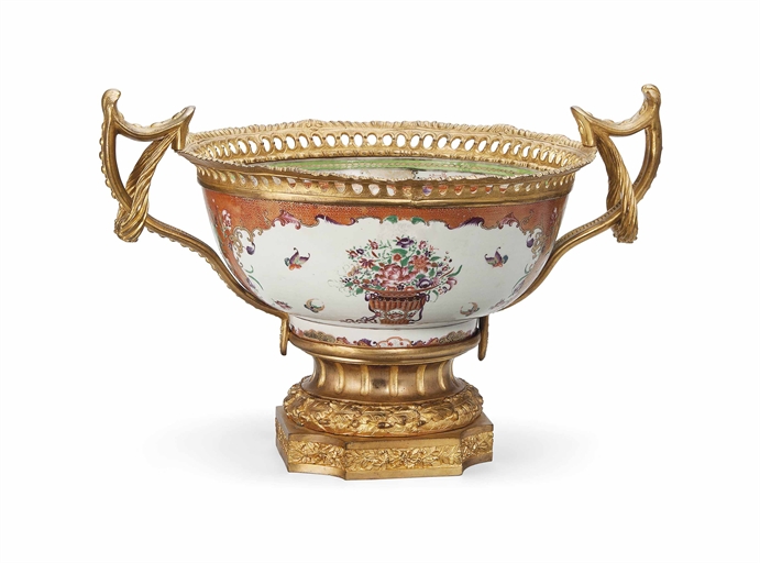 AN ORMOLU-MOUNTED CHINESE FAMILLE ROSE BOWL
QIANLONG PERIOD (1736-95)
With four shaped panels each
