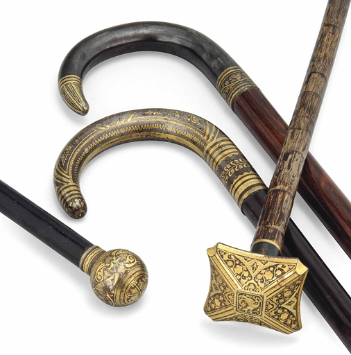 A GROUP OF FOUR TOLEDO-WARE STEEL AND GILT INLAID MOUNTED WALKING CANES
LATE 19TH CENTURY
The