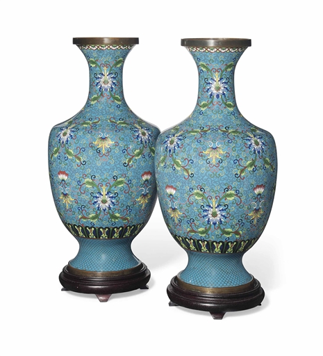 A PAIR OF CHINESE CLOISONNÉ ENAMEL BALUSTER VASES
19TH/20TH CENTURY
Each decorated with lotus