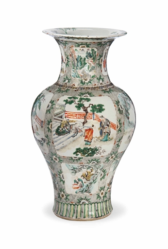 A CHINESE FAMILLE VERTE BALUSTER VASE
19TH CENTURY
With flaring rim, decorated with panels enclosing