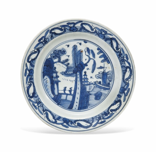 A CHINESE BLUE AND WHITE  DISH
16TH CENTURY
Decorated to the well with figures amongst pavilions