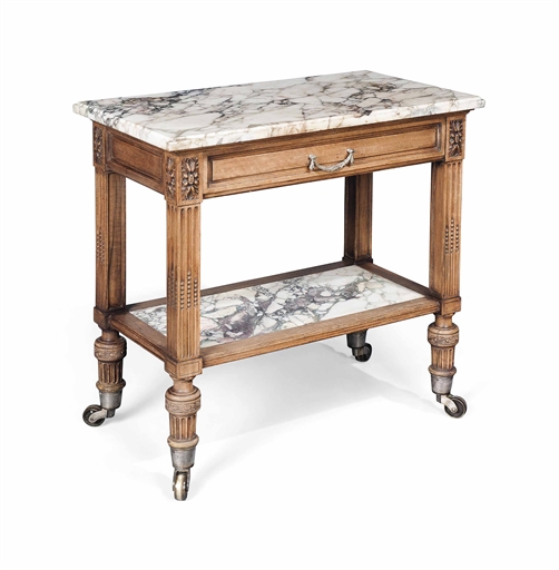 A FRENCH WALNUT BUFFET
OF LOUIS XVI STYLE, LATE 19TH CENTURY
The moulded rectangular breche violette