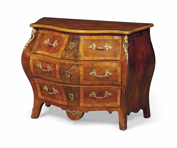 A SWEDISH GILT-METAL MOUNTED WALNUT AND KINGWOOD CROSSBANDED BOMBE COMMODE
LATE 19TH CENTURY
The