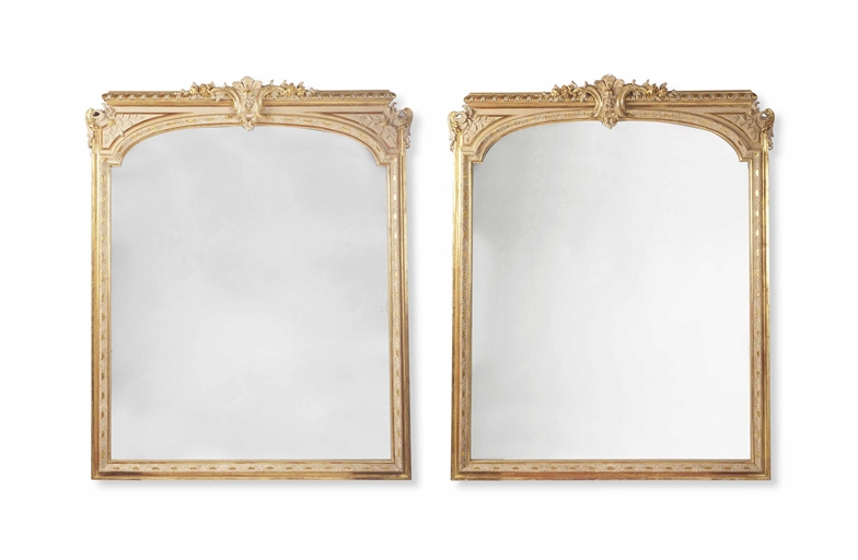 A MATCHED PAIR OF FRENCH CREAM-PAINTED AND PARCEL-GILT OVERMANTEL MIRRORS
20TH CENTURY
Each with